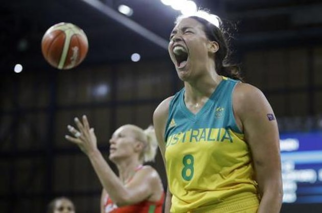 Australia center Liz Cambage reacts after making a basket and receiving a foul during the second half of a women's basketball game against Belarus at the Youth Center at the 2016 Summer Olympics in Rio de Janeiro, Brazil, Saturday, Aug. 13, 2016. Australia defeated Belarus 74-66. (AP Photo/Carlos Osorio)