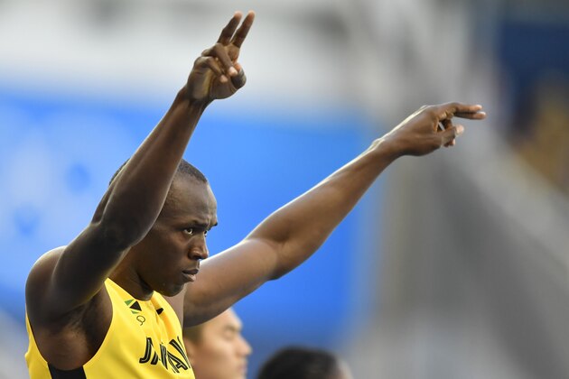 Jamaica's Usain Bolt competes in the Men's 100m Round 1 during the athletics event at the Rio 2016 Olympic Games at the Olympic Stadium in Rio de Janeiro on August 13, 2016.   / AFP / Fabrice COFFRINI        (Photo credit should read FABRICE COFFRINI/AFP/Getty Images)