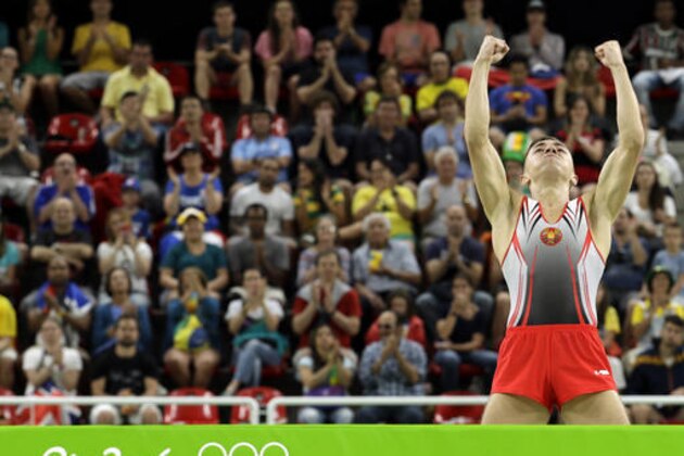 Belarus' Uladzislau Hancharou performs during the men's trampoline final at the 2016 Summer Olympics in Rio de Janeiro, Brazil, Saturday, Aug. 13, 2016. (AP Photo/Dmitri Lovetsky)