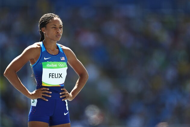 RIO DE JANEIRO, BRAZIL - AUGUST 13:  Allyson Felix of the United States   competes in round one of the Women's 400m on Day 8 of the Rio 2016 Olympic Games at the Olympic Stadium on August 13, 2016 in Rio de Janeiro, Brazil.  (Photo by Paul Gilham/Getty Images)