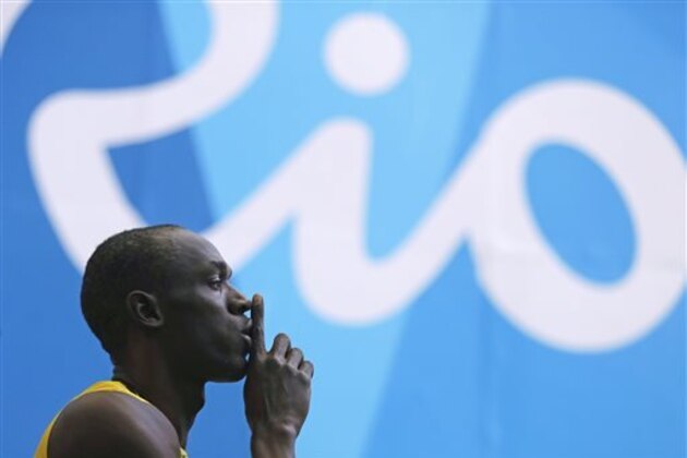 Jamaica's Usain Bolt arrives in the stadium to compete in a men's 100-meter heat during the athletics competitions of the 2016 Summer Olympics at the Olympic stadium in Rio de Janeiro, Brazil, Saturday, Aug. 13, 2016. (AP Photo/Jae C. Hong)