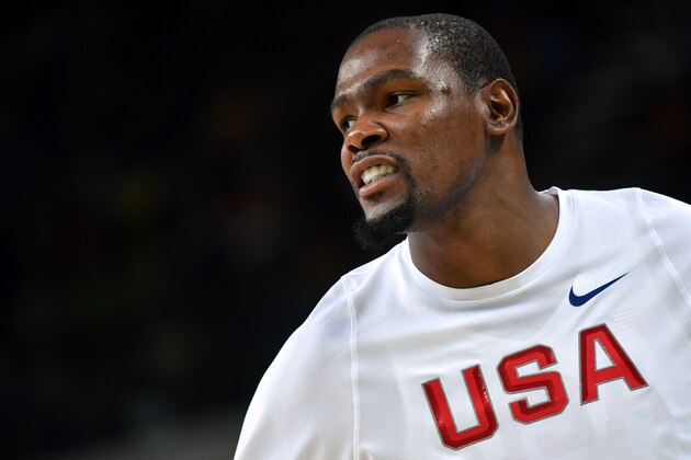 USA's guard Kevin Durant looks on during a Men's round Group A basketball match between USA and Serbia at the Carioca Arena 1 in Rio de Janeiro on August 12, 2016 during the Rio 2016 Olympic Games. / AFP / Andrej ISAKOVIC        (Photo credit should read ANDREJ ISAKOVIC/AFP/Getty Images)