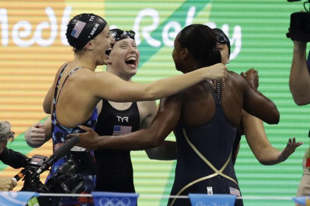Team United States reacts after winning the women's 4 x 100-meter medley relay final during the swimming competitions at the 2016 Summer Olympics, Saturday, Aug. 13, 2016, in Rio de Janeiro, Brazil. (AP Photo/Dmitri Lovetsky)