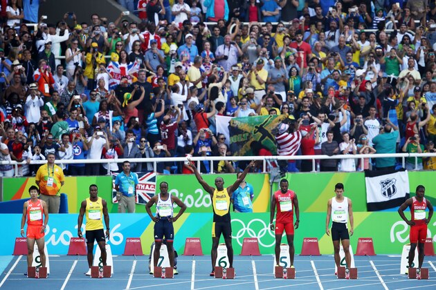 RIO DE JANEIRO, BRAZIL - AUGUST 13:  Usain Bolt of Jamaica salutes the crowd at the start of the Men's 100m Round 1 on Day 8 of the Rio 2016 Olympic Games at the Olympic Stadium on August 13, 2016 in Rio de Janeiro, Brazil.  (Photo by Cameron Spencer/Getty Images)