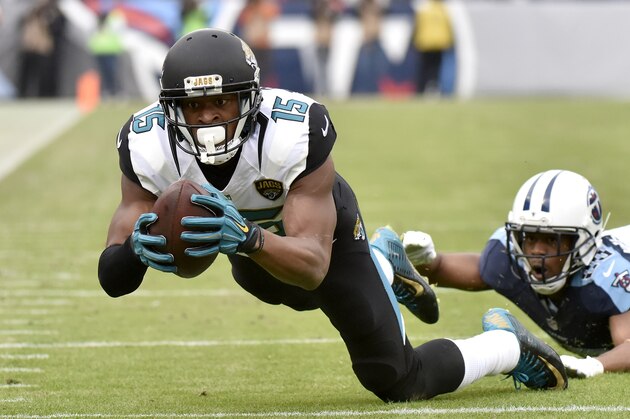 NASHVILLE, TN - DECEMBER 6:  Allen Robinson #15 of the Jacksonville Jaguars makes a catch against Tennessee Titans during the game at Nissan Stadium on December 6, 2015 in Nashville, Tennessee. (Photo by Frederick Breedon/Getty Images)