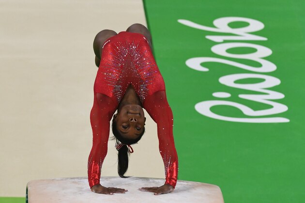 US gymnast Simone Biles competes in the women's vault event final of the Artistic Gymnastics at the Olympic Arena during the Rio 2016 Olympic Games in Rio de Janeiro on August 14, 2016. / AFP / Toshifumi KITAMURA        (Photo credit should read TOSHIFUMI KITAMURA/AFP/Getty Images)