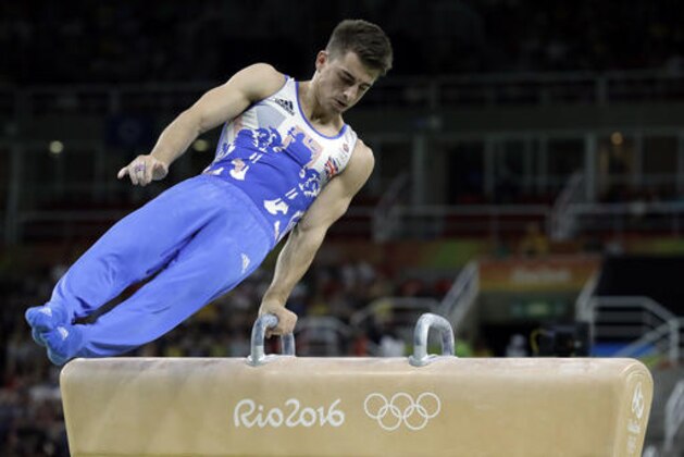 Britain's Max Whitlock performs on the pommel horse during the artistic gymnastics men's apparatus final at the 2016 Summer Olympics in Rio de Janeiro, Brazil, Sunday, Aug. 14, 2016. (AP Photo/Rebecca Blackwell)