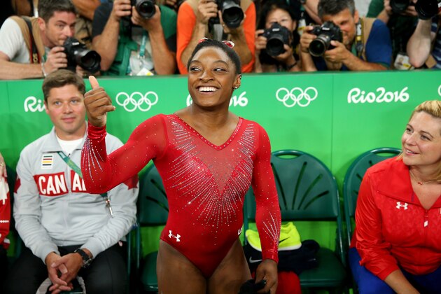 RIO DE JANEIRO, BRAZIL - AUGUST 14:  Simone Biles of the United States celebrates winning the gold medal in the Women's Vault Final on Day 9 of the Rio 2016 Olympic Games at the Rio Olympic Arena on August 14, 2016 in Rio de Janeiro, Brazil.  (Photo by Alex Livesey/Getty Images)