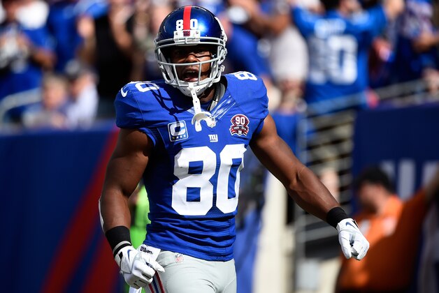 EAST RUTHERFORD, NJ - SEPTEMBER 14:  Wide receiver Victor Cruz #80 of the New York Giants reacts to a pass interference call against cornerback Patrick Peterson #21 of the Arizona Cardinals during a game at MetLife Stadium on September 14, 2014 in East Rutherford, New Jersey.  (Photo by Alex Goodlett/Getty Images)