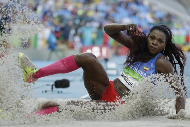 Colombia's Caterine Ibarguen competes in a qualifying round of the women's triple jump during the athletics competitions of the 2016 Summer Olympics at the Olympic stadium in Rio de Janeiro, Brazil, Saturday, Aug. 13, 2016. (AP Photo/Matt Dunham)