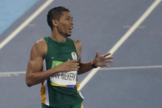 South Africa's Wayde Van Niekerk wins the men's 400-meter final setting a new world record during the athletics competitions of the 2016 Summer Olympics at the Olympic stadium in Rio de Janeiro, Brazil, Sunday, Aug. 14, 2016. (AP Photo/Julio Cortez)