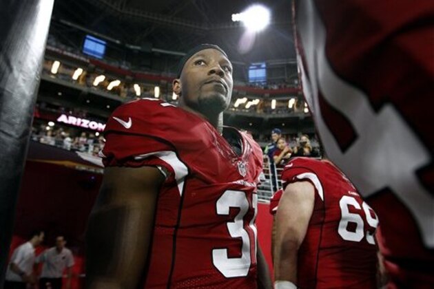 Arizona Cardinals running back David Johnson (31) exits the player tunnel with teammates before the start of an NFL preseason football game against the Oakland Raiders, Friday, Aug. 12, 2016, in Glendale, Ariz. (AP Photo/Ralph Freso)