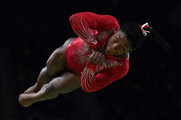 US gymnast Simone Biles competes in the women's vault event final of the Artistic Gymnastics at the Olympic Arena during the Rio 2016 Olympic Games in Rio de Janeiro on August 14, 2016. / AFP / Ben STANSALL        (Photo credit should read BEN STANSALL/AFP/Getty Images)