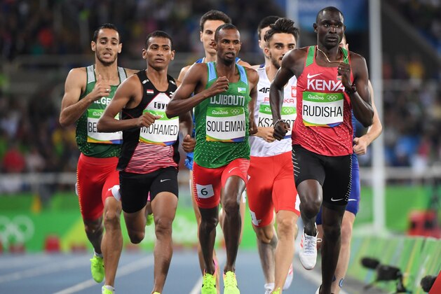 Kenya's David Lekuta Rudisha (R) leads the field in the Men's 800m Semifinal during the athletics event at the Rio 2016 Olympic Games at the Olympic Stadium in Rio de Janeiro on August 13, 2016.   / AFP / OLIVIER MORIN        (Photo credit should read OLIVIER MORIN/AFP/Getty Images)