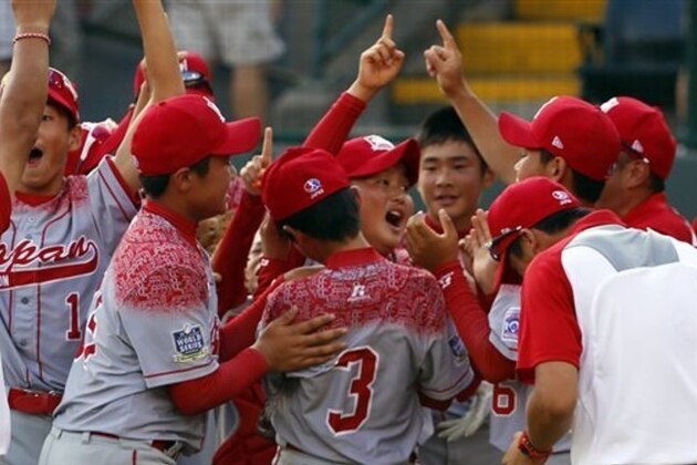Japan celebrates after winning the Little League World Series Championship baseball game over Lewisberry, Pa. in South Williamsport, Pa., Sunday, Aug. 30, 2015. Japan won 18-11. (AP Photo/Gene J. Puskar)