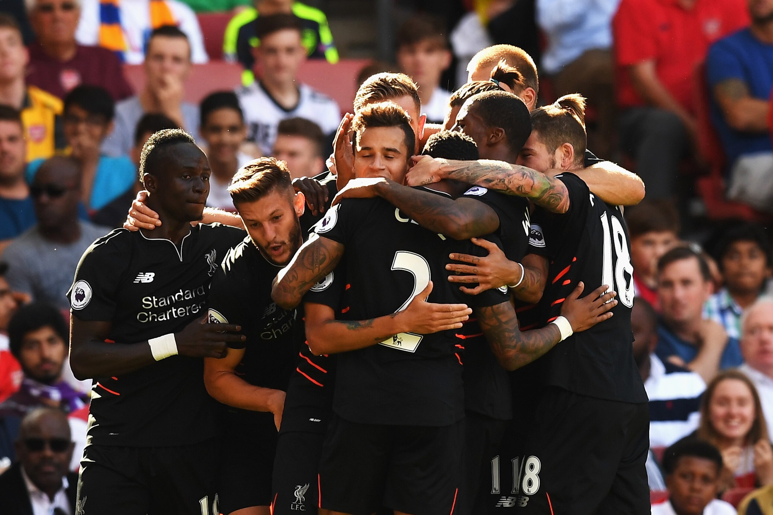 LONDON, ENGLAND - AUGUST 14:  Philippe Coutinho of Liverpool celebrates scoring his team's third goal with team mates during the Premier League match between Arsenal and Liverpool at Emirates Stadium on August 14, 2016 in London, England.  (Photo by Michael Regan/Getty Images)