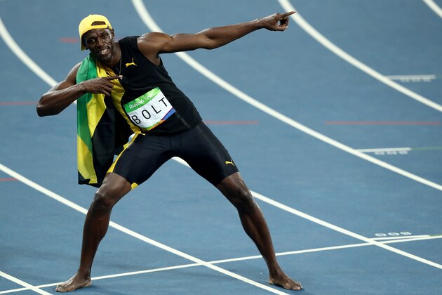 RIO DE JANEIRO, BRAZIL - AUGUST 14:  Usain Bolt of Jamaica celebrates winning the Men's 100 meter final on Day 9 of the Rio 2016 Olympic Games at the Olympic Stadium on August 14, 2016 in Rio de Janeiro, Brazil.  (Photo by Ezra Shaw/Getty Images)