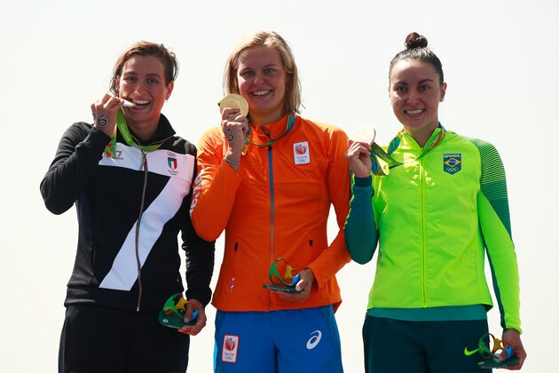RIO DE JANEIRO, BRAZIL - AUGUST 15:  (L-R) Silver medalist Rachele Bruni of Italy, gold medalist Sharon van Rouwendaal of the Netherlands and bronze medalist Poliana Okimoto of Brazil pose on the podium during the medal ceremony for the Women's 10km Marathon Swimming on day 10 of the Rio 2016 Olympic Games at Fort Copacabana on August 15, 2016 in Rio de Janeiro, Brazil.  (Photo by Adam Pretty/Getty Images)