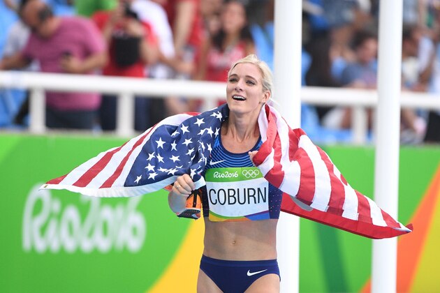 USA's Emma Coburn celebrates her third place in the Women's 3000m Steeplechase Final during the athletics event at the Rio 2016 Olympic Games at the Olympic Stadium in Rio de Janeiro on August 15, 2016.   / AFP / Johannes EISELE        (Photo credit should read JOHANNES EISELE/AFP/Getty Images)