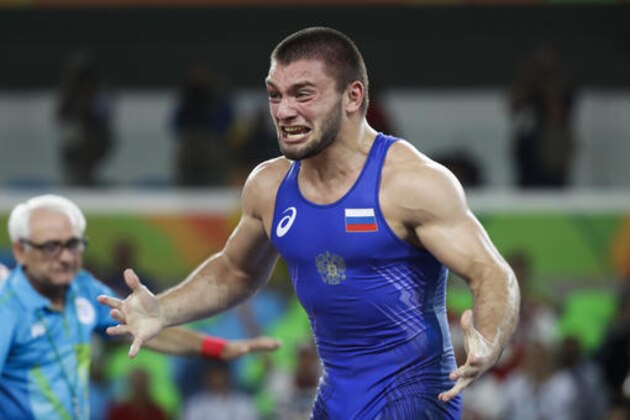 Russia's Davit Chakvetadze celebrates after winning the gold medal during the men's wrestling Greco-Roman 85-kg competition at the 2016 Summer Olympics in Rio de Janeiro, Brazil, Monday, Aug. 15, 2016. (AP Photo/Markus Schreiber)
