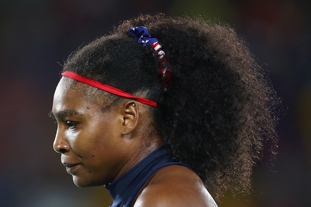 RIO DE JANEIRO, BRAZIL - AUGUST 09:  Serena Williams of the United States reacts during a Women's Singles Third Round match against Elina Svitolina of Ukraine on Day 4 of the Rio 2016 Olympic Games at the Olympic Tennis Centre on August 9, 2016 in Rio de Janeiro, Brazil.  (Photo by Cameron Spencer/Getty Images)