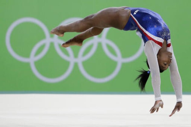 United States' Simone Biles performs on the floor during the artistic gymnastics women's individual all-around final at the 2016 Summer Olympics in Rio de Janeiro, Brazil, Thursday, Aug. 11, 2016. (AP Photo/David Goldman)