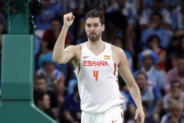 Spain's Pau Gasol (4) reacts to a score against Argentina during a men's basketball game at the 2016 Summer Olympics in Rio de Janeiro, Brazil, Monday, Aug. 15, 2016. (AP Photo/Eric Gay)