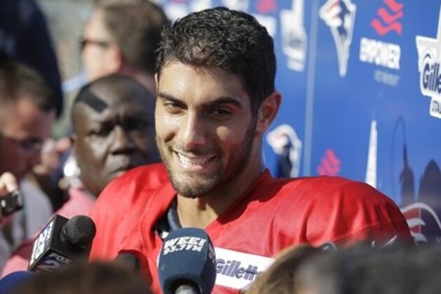 New England Patriots quarterback Jimmy Garoppolo faces reporters following an NFL football training camp practice with the Chicago Bears, Monday, Aug. 15, 2016, in Foxborough, Mass. (AP Photo/Steven Senne)
