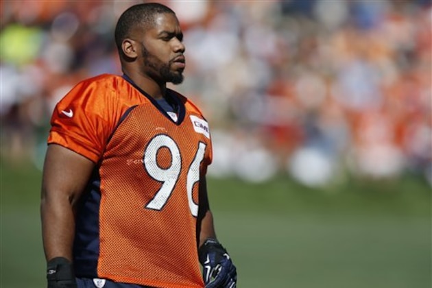 Denver Broncos defensive tackle Vance Walker (96) looks on at the team's NFL football training camp Friday, July 31, 2015, in Englewood, Colo. (AP Photo/David Zalubowski)