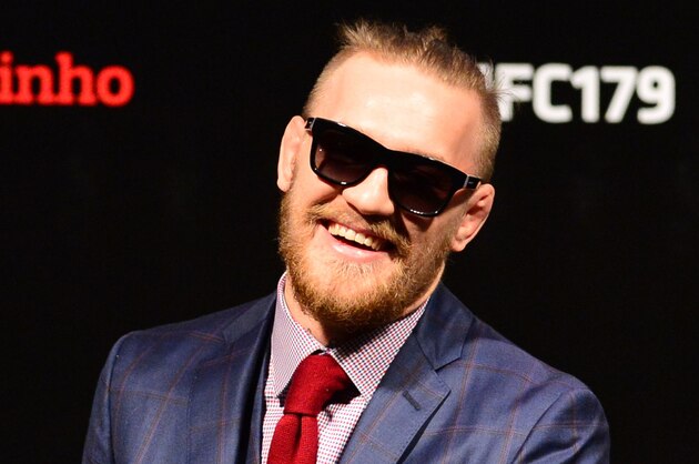 Oct 24, 2014; Rio de Janeiro, BRAZIL; Conor McGregor interacts with fans during a Q&A session before weigh-ins for UFC 179 at Ginasio do Maracanazinho. Mandatory Credit: Jason Silva-USA TODAY Sports