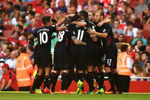 LONDON, ENGLAND - AUGUST 14: Liverpool players celebrate their second goal during the Premier League match between Arsenal and Liverpool at Emirates Stadium on August 14, 2016 in London, England.  (Photo by Mike Hewitt/Getty Images)