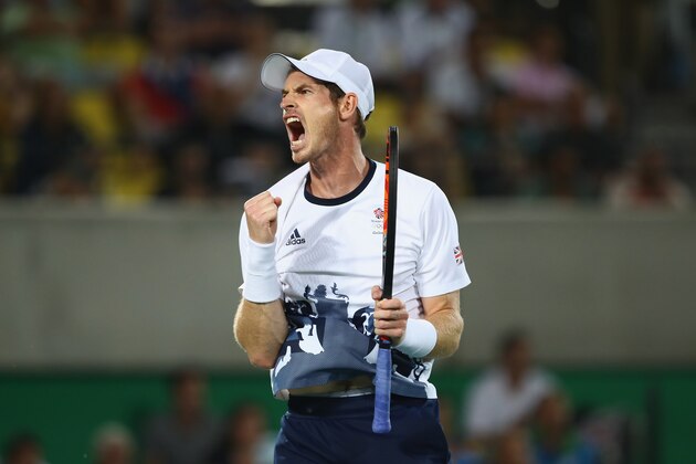 RIO DE JANEIRO, BRAZIL - AUGUST 14:  Andy Murray of Great Britain celebrates winning match point during the men's singles gold medal match against Juan Martin Del Potro of Argentina on Day 9 of the Rio 2016 Olympic Games at the Olympic Tennis Centre on August 14, 2016 in Rio de Janeiro, Brazil.  (Photo by Clive Brunskill/Getty Images)