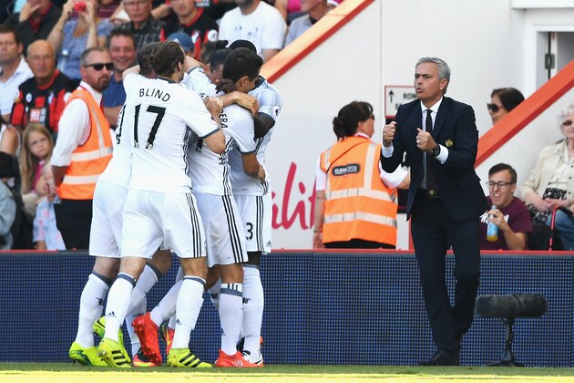 BOURNEMOUTH, ENGLAND - AUGUST 14:  Manager of Manchester United, Jose Mourinho talks to his players after the goal scored by Zlatan Ibrahimovic of Manchester United during the Premier League match between AFC Bournemouth and Manchester United at Vitality Stadium on August 14, 2016 in Bournemouth, England.  (Photo by Stu Forster/Getty Images)