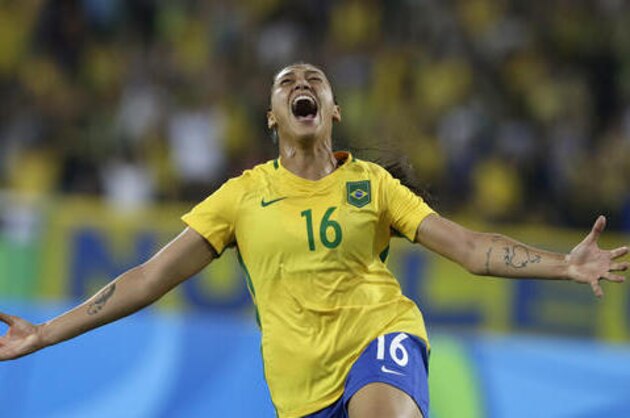 Brazil's Beatriz celebrates scoring her side's first goal during a group E match of the women's Olympic football tournament between Sweden and Brazil at the Rio Olympic Stadium in Rio De Janeiro, Brazil, Saturday, Aug. 6, 2016. (AP Photo/Leo Correa)
