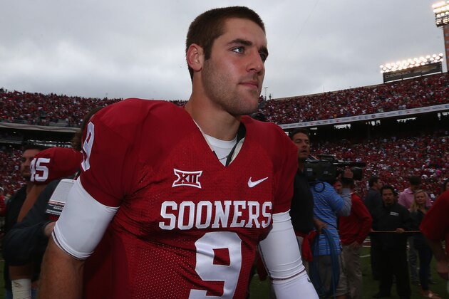 DALLAS, TX - OCTOBER 11:  Trevor Knight #9 of the Oklahoma Sooners celebrates a win against the Texas Longhorns at Cotton Bowl on October 11, 2014 in Dallas, Texas.  (Photo by Ronald Martinez/Getty Images)