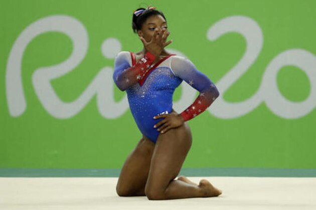 United States' Simone Biles performs on the floor during the artistic gymnastics women's apparatus final at the 2016 Summer Olympics in Rio de Janeiro, Brazil, Tuesday, Aug. 16, 2016. (AP Photo/Dmitri Lovetsky)
