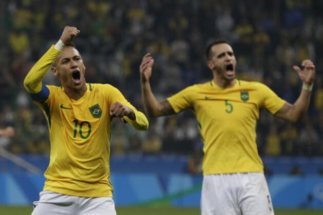 Brazil's Neymar, left, and Renato Augusto celebrate at the end of a quarter-final match of the men's Olympic football tournament against Colombia in Sao Paulo, Brazil, Saturday Aug. 13, 2016. Brazil won 2-0 and qualified for the semi-finals.(AP Photo/Leo Correa)