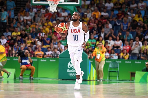 RIO DE JANEIRO, BRAZIL - AUGUST 14th: Kyrie Irving #10 of the USA Basketball Men's National Team handles the ball during the game against France on August 14th, 2016 at the Barra Carioca in Rio de Janeiro, Brazil NOTE TO USER: User expressly acknowledges and agrees that, by downloading and/or using this Photograph, user is consenting to the terms and conditions of the Getty Images License Agreement. Mandatory Copyright Notice: Copyright 2016 NBAE (Photo by Jesse D. Garrabrant/NBAE via Getty Images)