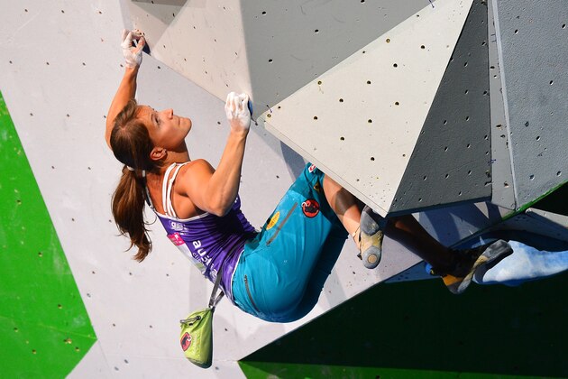 Austria's Anna Stohr competes during the Bouldering women final of the indoor World Climbing Championships 2012, on September 16, 2012, at the Palais Omnisports Paris Bercy (POPB) in Paris. The event, that runs until September 16, is organized by the International Federation of Sport Climbing (IFSC). AFP PHOTO / MIGUEL MEDINA        (Photo credit should read MIGUEL MEDINA/AFP/GettyImages)