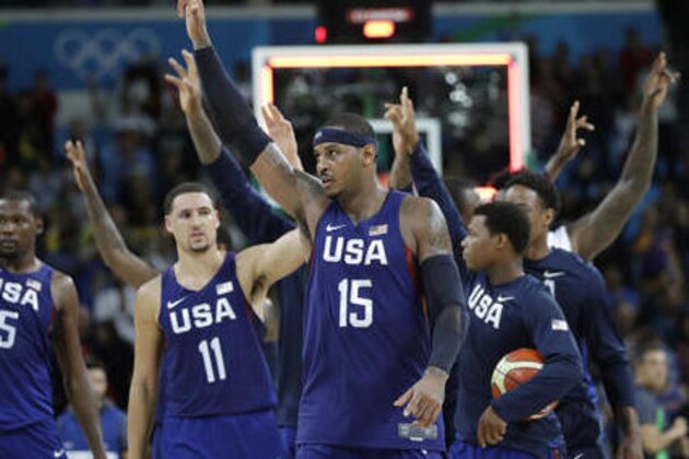 United States' Carmelo Anthony (15) and teammates walk off the court after their win over Australia in a men's basketball game at the 2016 Summer Olympics in Rio de Janeiro, Brazil, Wednesday, Aug. 10, 2016. (AP Photo/Eric Gay)