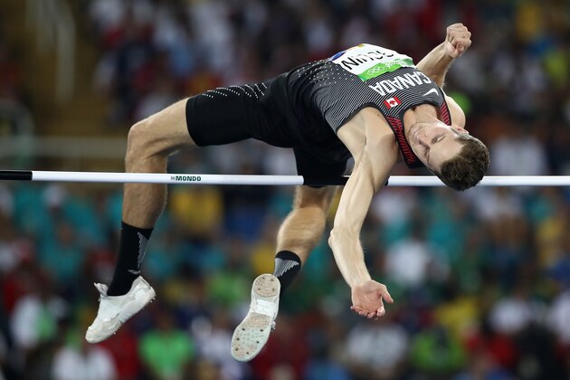RIO DE JANEIRO, BRAZIL - AUGUST 14:  Derek Drouin of Canada competes in the Men's High Jump qualification on Day 9 of the Rio 2016 Olympic Games at the Olympic Stadium on August 14, 2016 in Rio de Janeiro, Brazil.  (Photo by Cameron Spencer/Getty Images)