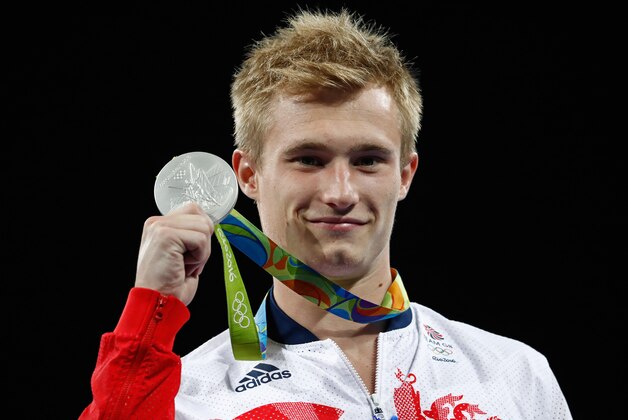 RIO DE JANEIRO, BRAZIL - AUGUST 16:  Silver medalist Jack Laugher of Great Britain poses during the medal ceremony for the Men's Diving 3m Springboard final at the Maria Lenk Aquatics Centre on August 16, 2016 in Rio de Janeiro, Brazil.  (Photo by Clive Rose/Getty Images)