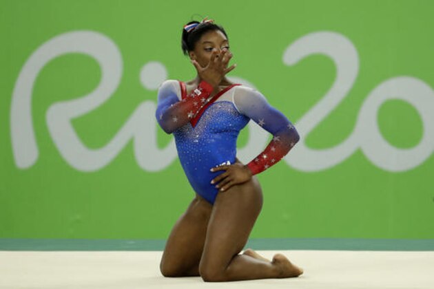 United States' Simone Biles performs on the floor during the artistic gymnastics women's apparatus final at the 2016 Summer Olympics in Rio de Janeiro, Brazil, Tuesday, Aug. 16, 2016. (AP Photo/Dmitri Lovetsky)