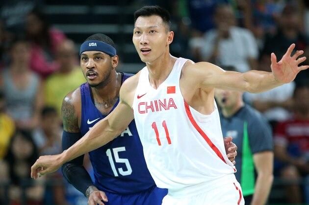 RIO DE JANEIRO, BRAZIL - AUGUST 6: Carmelo Anthony of USA and Jianlian Yi of China look on during the group phase basketball match between USA and China on day 1 of the Rio 2016 Olympic Games at Carioca Arena 1 on August 6, 2016 in Rio de Janeiro, Brazil. (Photo by Jean Catuffe/Getty Images)