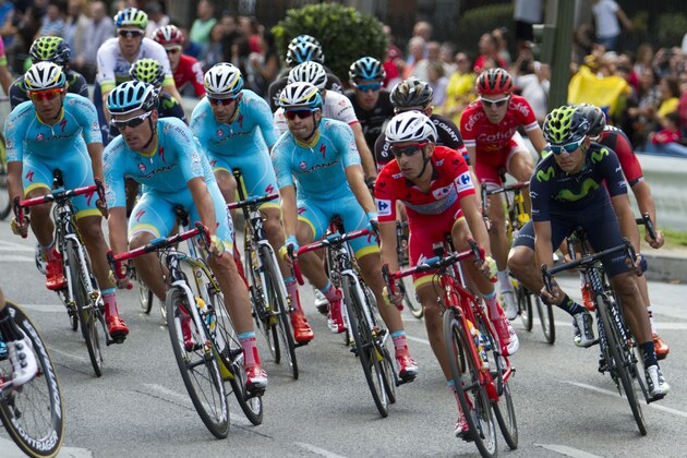 Astana's Italian cyclist Fabio Aru (2nd R) competes during the las stage of the 70th edition of 'La Vuelta' Tour of Spain, a 97,8 km route between Alcala de Henares and Madrid on September 13, 2015. AFP PHOTO/ JAIME REINA        (Photo credit should read JAIME REINA/AFP/Getty Images)