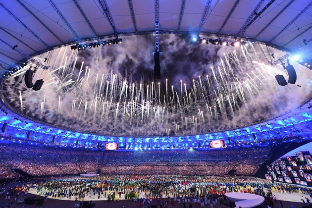 Fireworks light the sky above the athletes' delegations during the opening ceremony of the Rio 2016 Olympic Games at Maracana Stadium in Rio de Janeiro on August 5, 2016. / AFP / Kirill KUDRYAVTSEV        (Photo credit should read KIRILL KUDRYAVTSEV/AFP/Getty Images)
