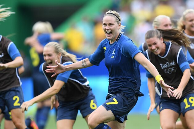 Swedish striker Lisa Dahlkvist celebrates after her winning penalty goal during the Brazil vs Sweden game at the Maracana stadium during the Rio 2016 Olympic Games football tournament on August 16, 2016.  / AFP / Martin BERNETTI        (Photo credit should read MARTIN BERNETTI/AFP/Getty Images)