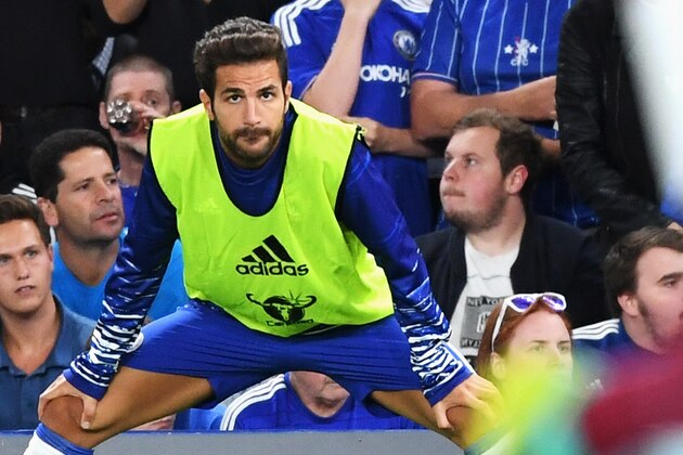 LONDON, ENGLAND - AUGUST 15:  Cesc Fabregas of Chelsea looks on from the sidelines during the Premier League match between Chelsea and West Ham United at Stamford Bridge on August 15, 2016 in London, England.  (Photo by Michael Regan/Getty Images)