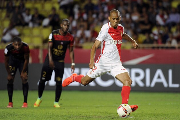 Monacos Brazilian midfielder Fabinho scores a penalty goal during the French L1 football match between Monaco and Guingamp on August 12, 2016, at the Louis II stadium in Monaco. / AFP / Franck PENNANT        (Photo credit should read FRANCK PENNANT/AFP/Getty Images)