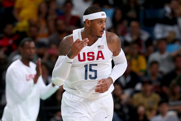 RIO DE JANEIRO, BRAZIL - AUGUST 12:  Carmelo Anthony #15 of United States reacts after making a three pointer while taking on Serbia in the Men's Preliminary Round Group A match on Day 7 of the Rio 2016 Olympic Games at Carioca Arena 1 on August 12, 2016 in Rio de Janeiro, Brazil.  (Photo by Tom Pennington/Getty Images)